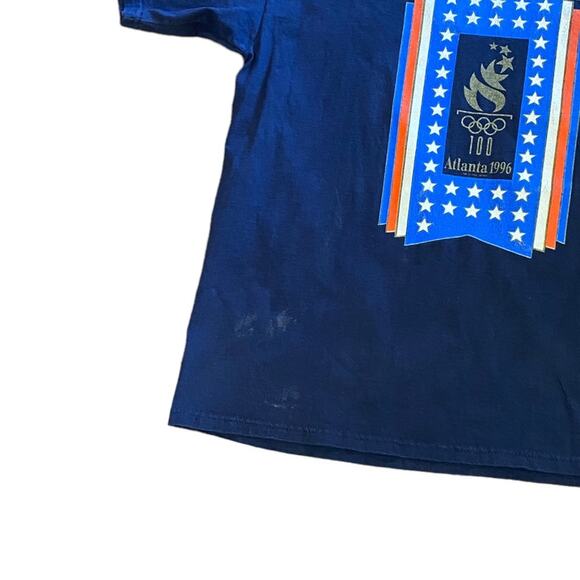 Vintage 1996 Olympics Champion T-shirt in a size extra-large navy short sleeve. - Picture 4 of 7
